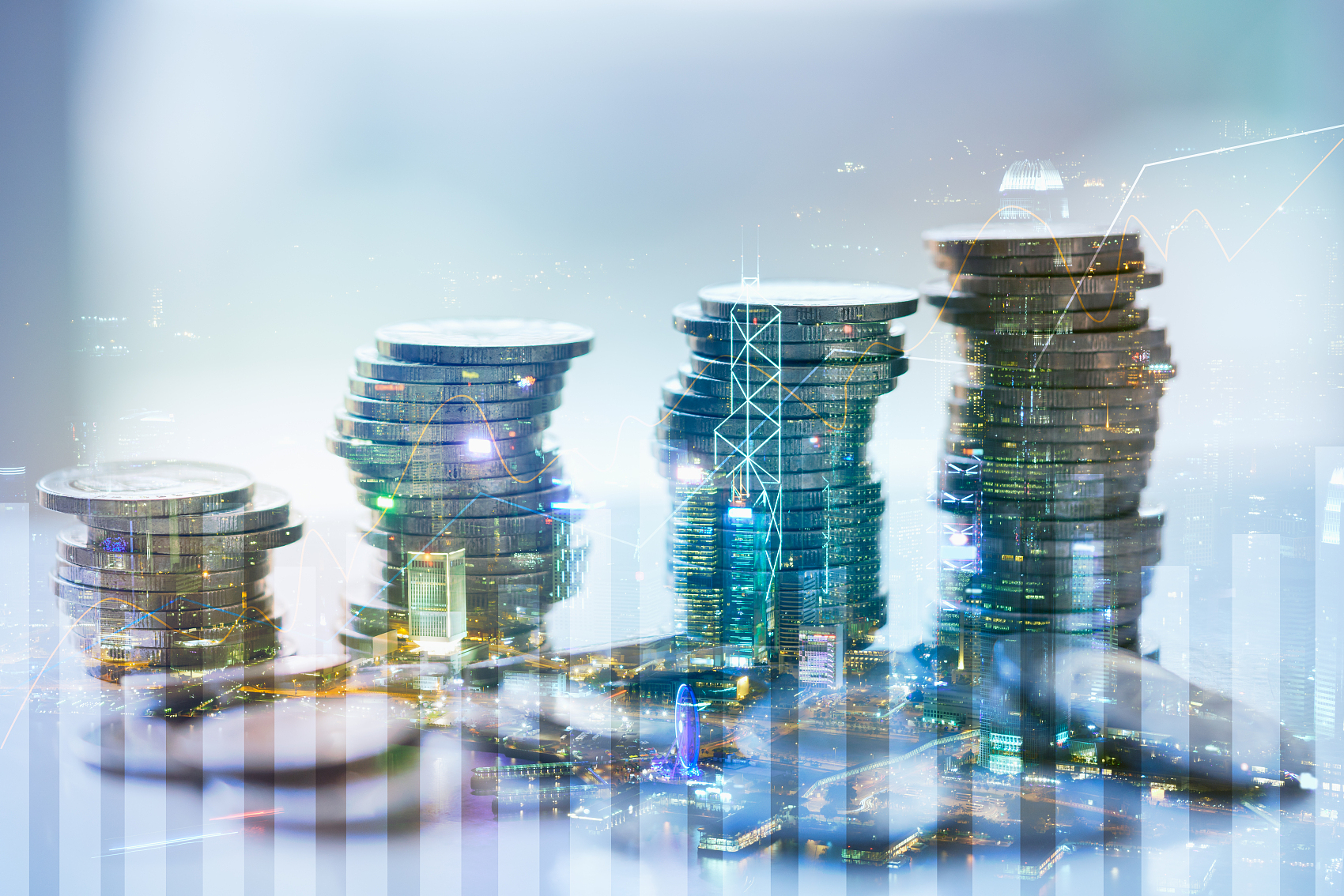 双重曝光的城市用图形和叠币的金融和经营理念.jpg